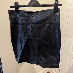 Wilfred. Aritzia. Faux leather mini. Tailored style- tight fitting. Black